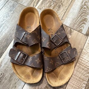 Brown LV Birkenstocks